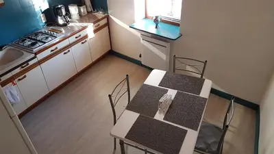 Cuisine ou kitchenette dans l'établissement Le Rucher Vertroland
