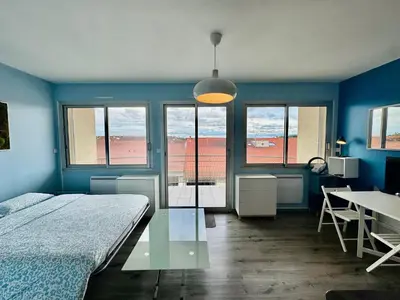 Un ou plusieurs lits dans un hébergement de l'établissement L'azur cosy studio Meyzieu