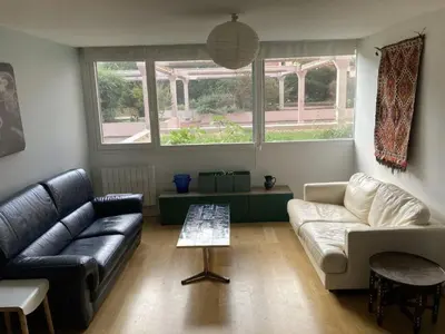 Coin salon dans l'établissement Quai du Rhone Two bedroom appartement