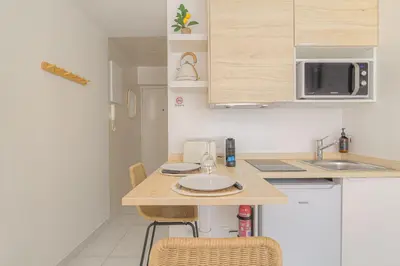 Cuisine ou kitchenette dans l'établissement L'Essentiel
