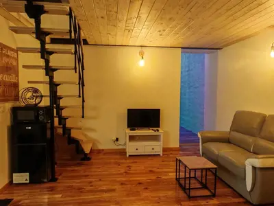 Télévision ou salle de divertissement dans l'établissement appartement cosy