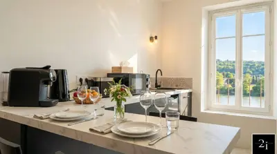 Cuisine ou kitchenette dans l'établissement LE 21 - Suite SPA Premium - Jacuzzi Privatif & Vue Rhône