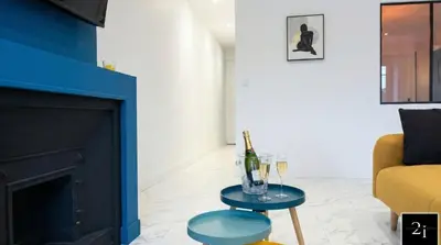 Coin salon dans l'établissement LE 21 - Suite SPA Premium - Jacuzzi Privatif & Vue Rhône