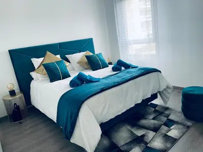 Un ou plusieurs lits dans un hébergement de l'établissement Appartement T2 Cosy