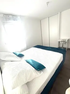 Un ou plusieurs lits dans un hébergement de l'établissement Appartement T2 Cosy