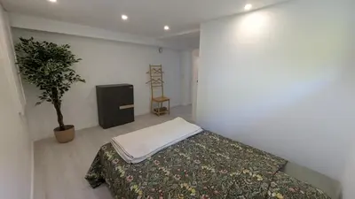 Un ou plusieurs lits dans un hébergement de l'établissement Les Loges de la Gallée