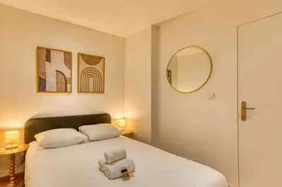 Un ou plusieurs lits dans un hébergement de l'établissement Le Bois Doré - Cosy - Sainte-Foy-Les-Lyon
