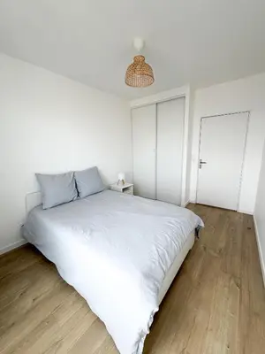 Un ou plusieurs lits dans un hébergement de l'établissement Cosy Soie