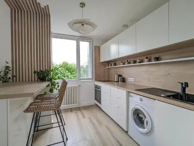 Cuisine ou kitchenette dans l'établissement T2 au calme, balcon, proche métro, parking gratuit