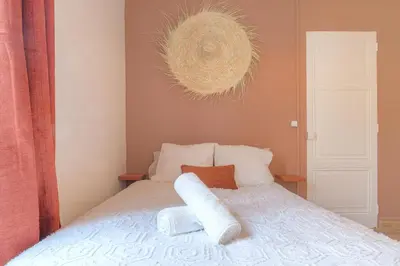 Un ou plusieurs lits dans un hébergement de l'établissement IDÉAL Pro & Couples - Calme- Dernier Etage - Cité des Affaires
