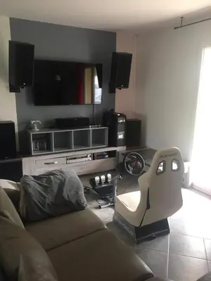 Coin salon dans l'établissement MAISON PRIVÉE AVEC PISCINe