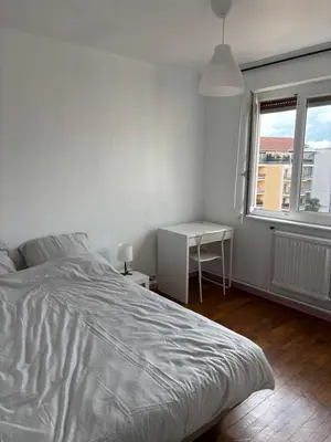 Un ou plusieurs lits dans un hébergement de l'établissement Appartement des merveilles
