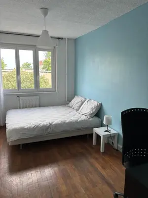 Un ou plusieurs lits dans un hébergement de l'établissement Appartement des merveilles