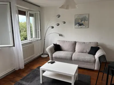 Coin salon dans l'établissement Appartement des merveilles