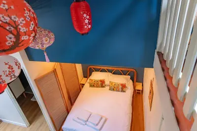 Un ou plusieurs lits dans un hébergement de l'établissement Maison Mori