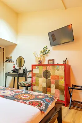 Télévision ou salle de divertissement dans l'établissement La Maison Mori