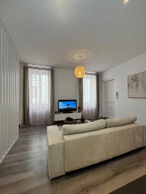 Télévision ou salle de divertissement dans l'établissement Loft au cœur de Tarare