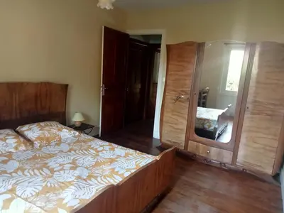 Un ou plusieurs lits dans un hébergement de l'établissement Maison en pisé
