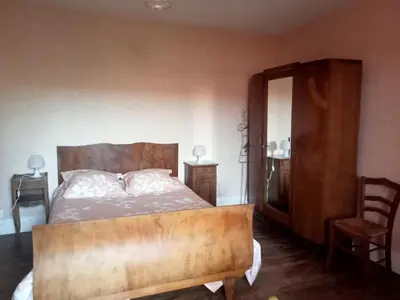 Un ou plusieurs lits dans un hébergement de l'établissement Maison en pisé