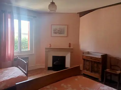 Un ou plusieurs lits dans un hébergement de l'établissement Maison en pisé