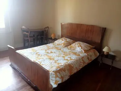 Un ou plusieurs lits dans un hébergement de l'établissement Maison en pisé