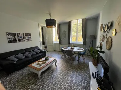 Coin salon dans l'établissement Appartement dans le Beaujolais