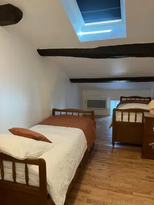 Un ou plusieurs lits dans un hébergement de l'établissement Maison de village - Font Bénite