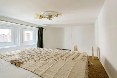 Un ou plusieurs lits dans un hébergement de l'établissement Apartment in the heart of Presqu’île Lyon