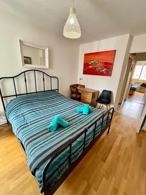 Un ou plusieurs lits dans un hébergement de l'établissement 2 chambres, garage voiture, résidence calme