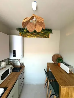 Cuisine ou kitchenette dans l'établissement La Cachette Sauvage au cœur de Villefranche