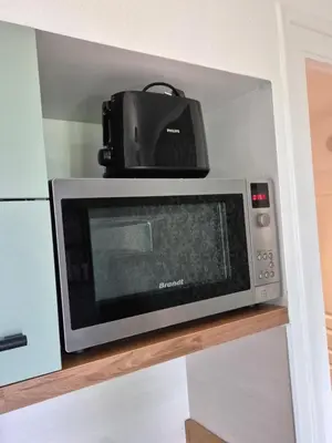 Cuisine ou kitchenette dans l'établissement L'Olivier Studio Cosy & Calme Idéal Duo ou Pro