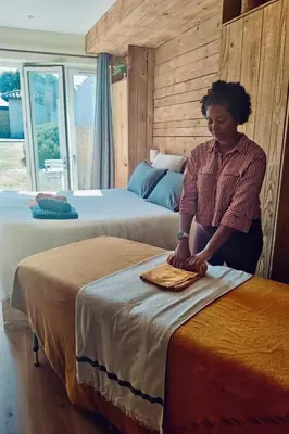 Un ou plusieurs lits dans un hébergement de l'établissement Le Petit Oingt de Paradis Chambre d'hôtes
