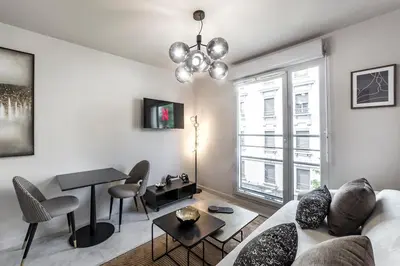 Télévision ou salle de divertissement dans l'établissement Studio Madison Vaise