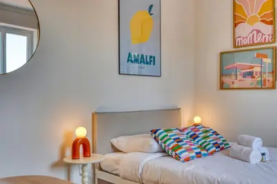 Un ou plusieurs lits dans un hébergement de l'établissement La Suite DolceVita - Lyon 5 - lumineux et rénové