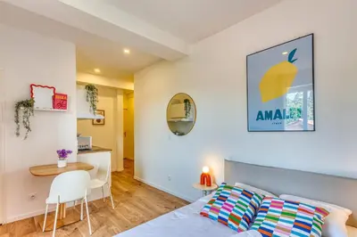 Un ou plusieurs lits dans un hébergement de l'établissement La Suite DolceVita - Lyon 5 - lumineux et rénové