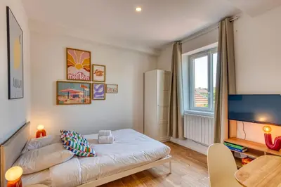 Un ou plusieurs lits dans un hébergement de l'établissement La Suite DolceVita - Lyon 5 - lumineux et rénové