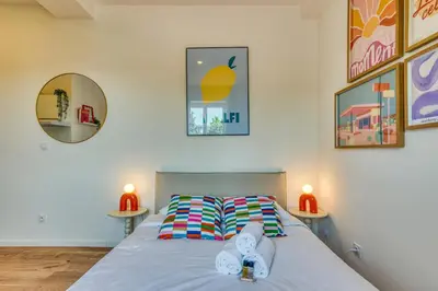 Un ou plusieurs lits dans un hébergement de l'établissement La Suite DolceVita - Lyon 5 - lumineux et rénové
