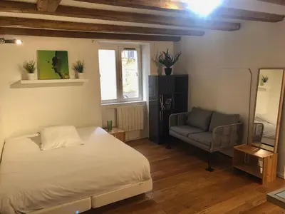 Un ou plusieurs lits dans un hébergement de l'établissement Studio calme - pentes de la croix rousse