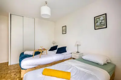 Un ou plusieurs lits dans un hébergement de l'établissement BnGo I Immense Terrasses I 3 chambres, garage, 9 pers