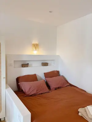 Un ou plusieurs lits dans un hébergement de l'établissement Studio cosy avec extérieur - Lyon Eurexpo Stadium