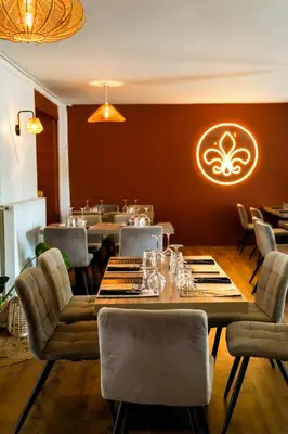 Coin salon dans l'établissement Hôtel des Lys