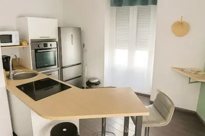 Cuisine ou kitchenette dans l'établissement Cozy T2 near Part-Dieu 4 people Lafayette District