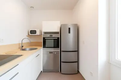 Cuisine ou kitchenette dans l'établissement Cozy T2 near Part-Dieu 4 people Lafayette District