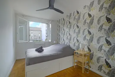 Un ou plusieurs lits dans un hébergement de l'établissement Appartement de caractère Central Cosy & Calme