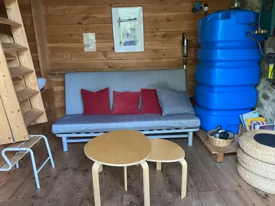 Coin salon dans l'établissement Mon rêve de garçon - Cabanes connectées à la nature