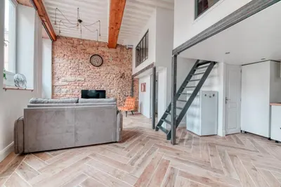 Télévision ou salle de divertissement dans l'établissement Le Pouteau charme authentique 2 chambres