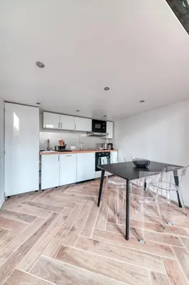Cuisine ou kitchenette dans l'établissement Le Pouteau charme authentique 2 chambres