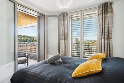 Un ou plusieurs lits dans un hébergement de l'établissement Magnifique appartement 70m2 Confluence - Vue panoramique avec Parking Privé