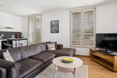 Télévision ou salle de divertissement dans l'établissement Magnifique appartement 70m2 Confluence - Vue panoramique avec Parking Privé