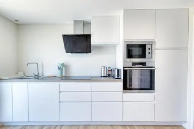 Cuisine ou kitchenette dans l'établissement Le Nid de Jons